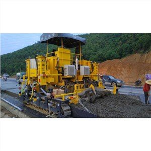 Machine de construction de routes en ciment